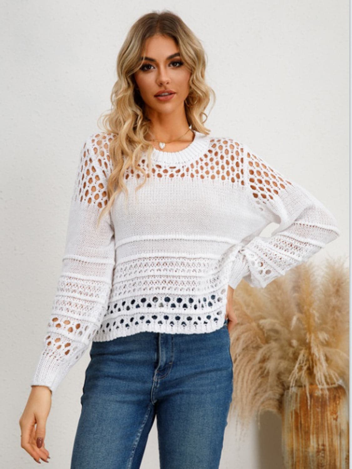 Cutout Round Neck Knit Top.