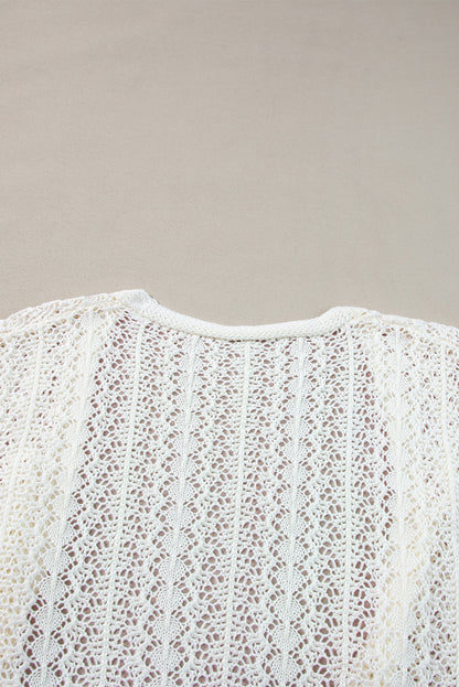 Chic white knit cardigan with hollow out details and drop shoulder design