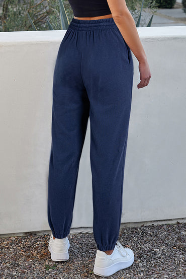 Navy blue fleece-lined joggers with adjustable drawstring waist