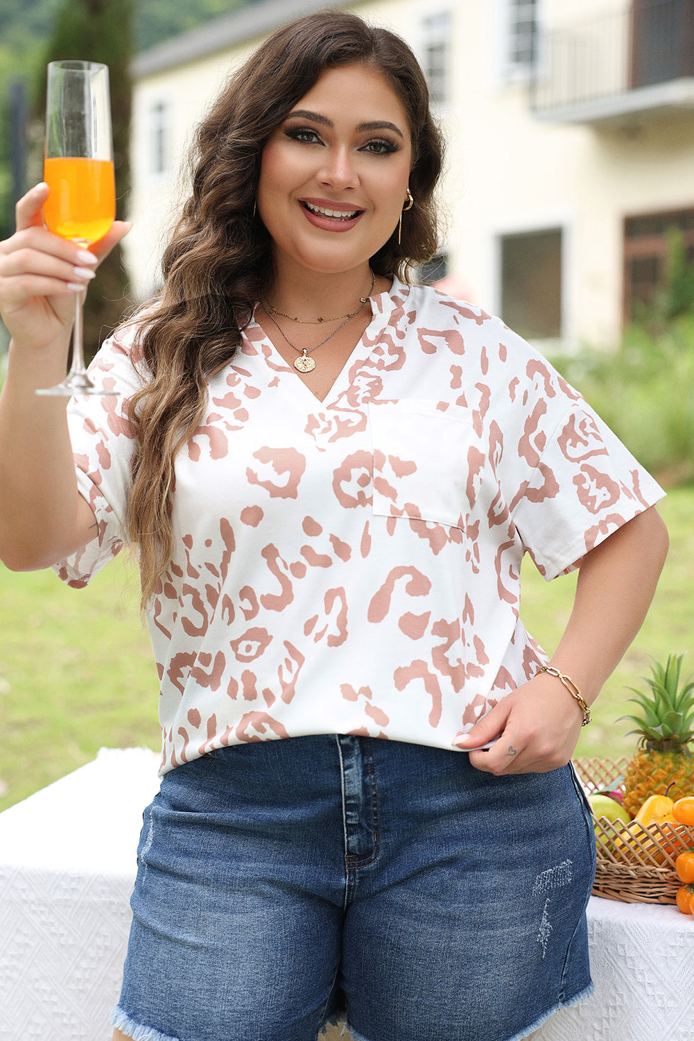 Chic white plus size leopard print v-neck top for effortless style