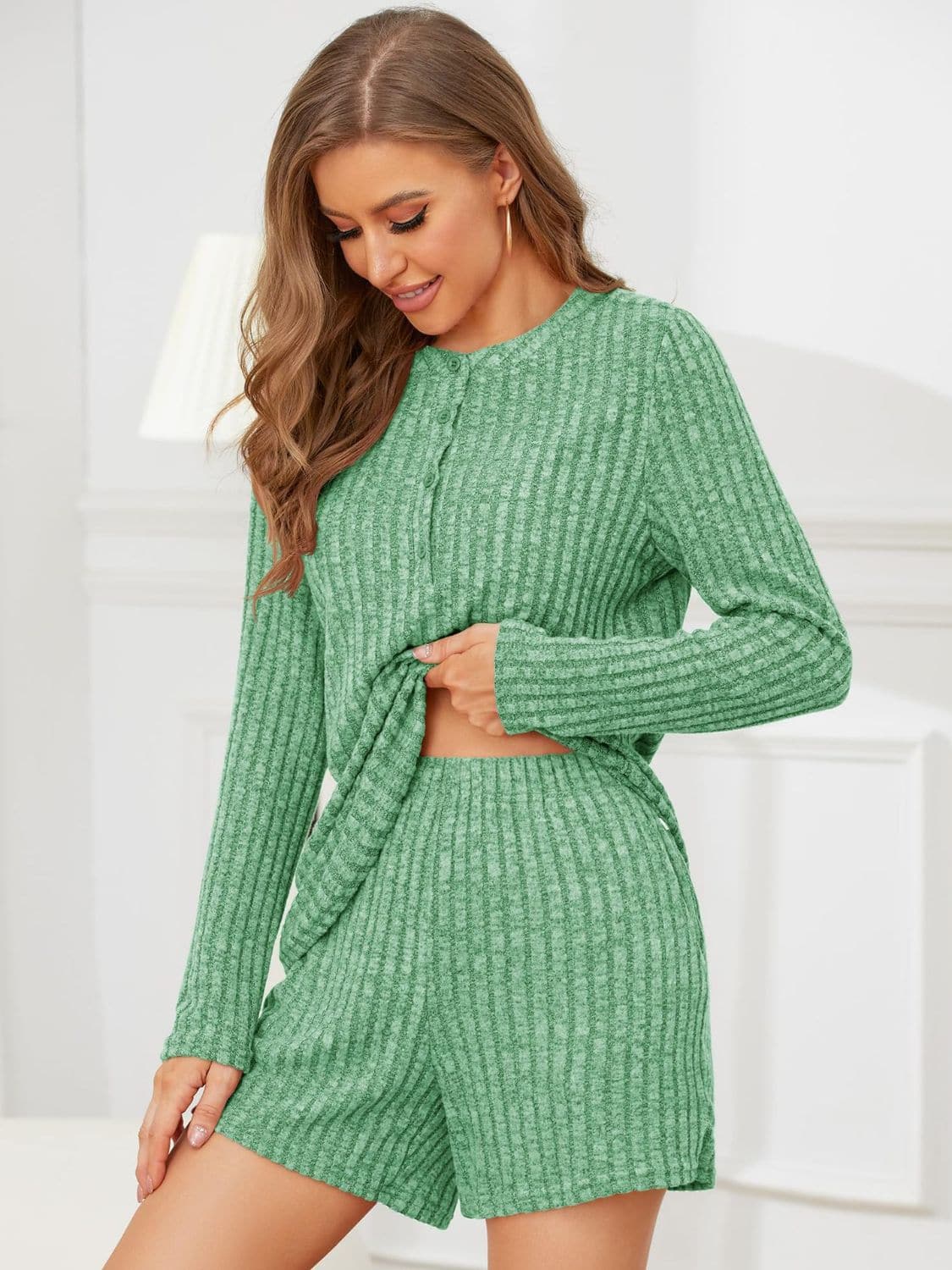 Ribbed Round Neck Top and Shorts SetFeatures: Buttoned
Number of pieces: Two-piece
Stretch: Slightly stretchy
Material composition: 100% polyester
Care instructions: Machine wash cold. Tumble dry low.
Love Salve Ribbed Round Neck TopTwo-Piece Sets