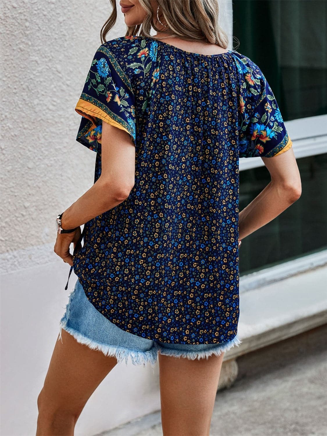 Tied Printed Short Sleeve Blouse.