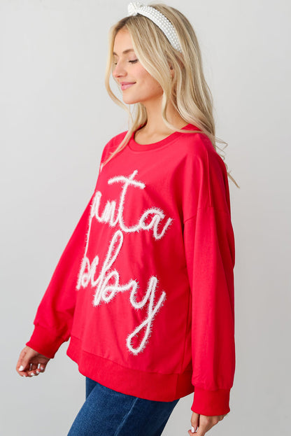 Festive red Santa baby tinsel graphic cozy sweatshirt