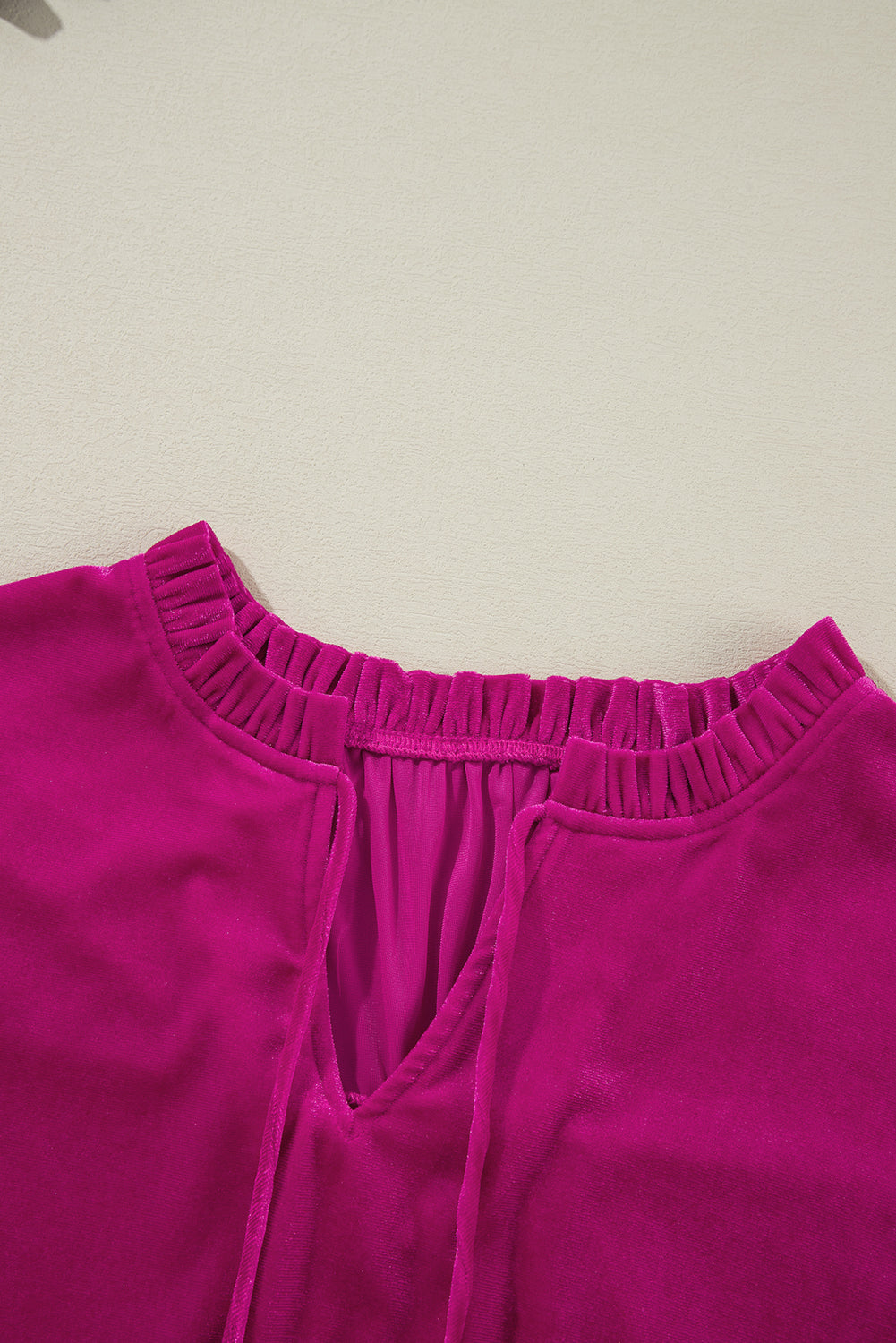 Chic bright pink velvet blouse with ruffled sleeves for plus sizes