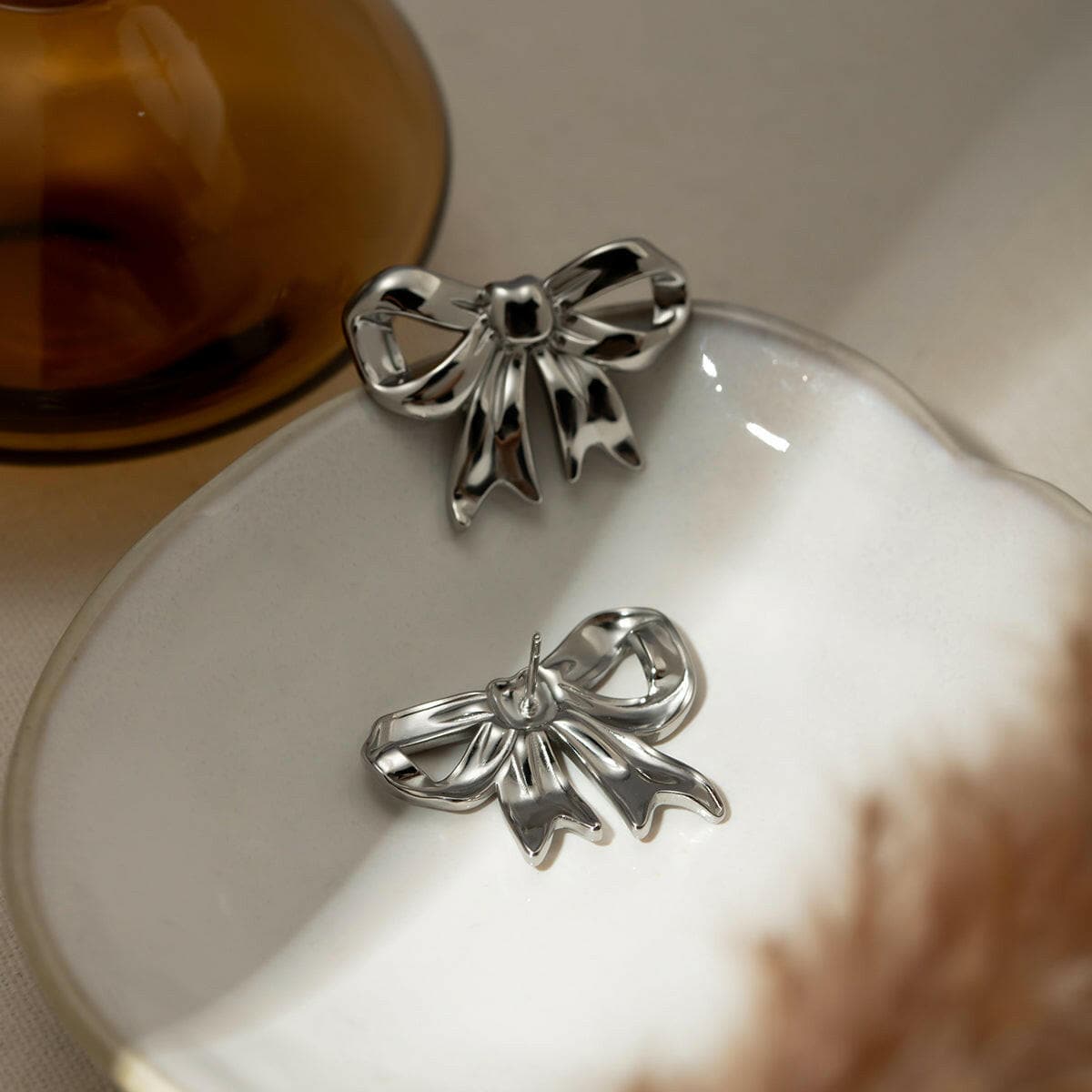 Stainless Steel Bow Stud Earrings.