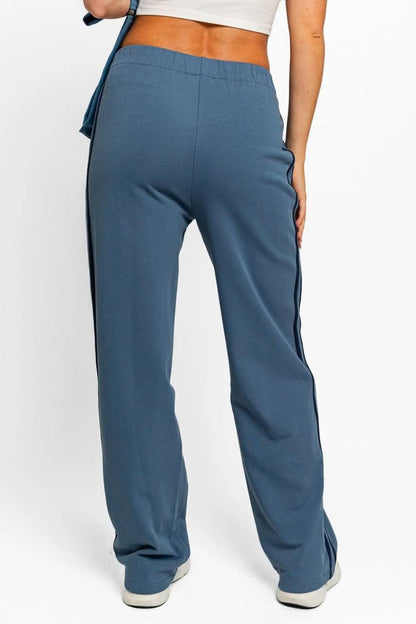 Chic high-waisted track sweatpants with stylish side stripes