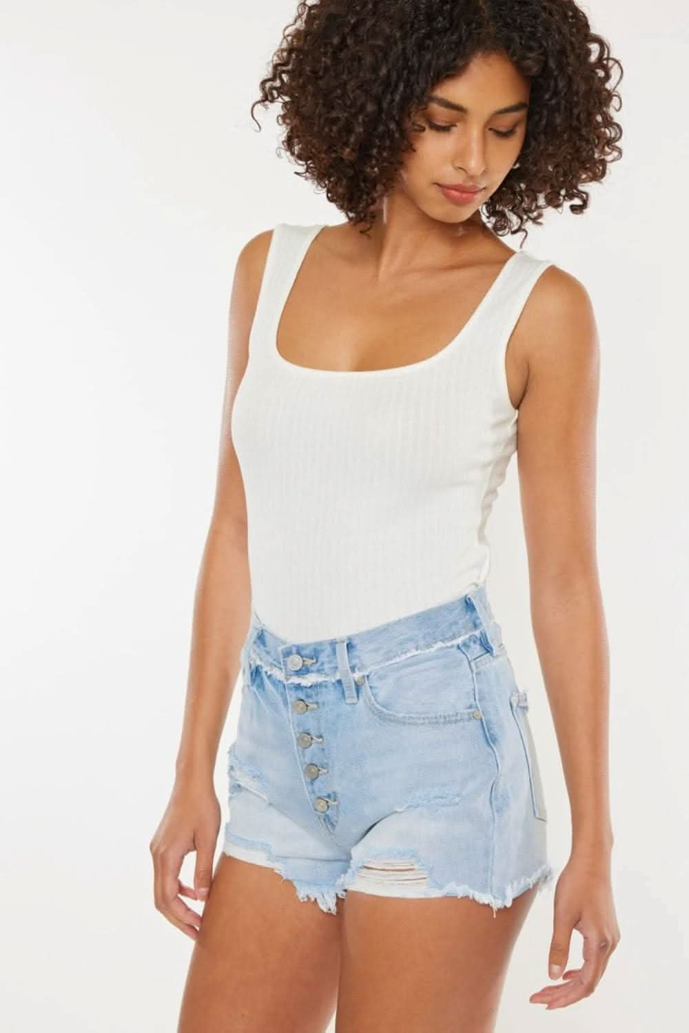 Edgy chic distressed button-fly denim shorts