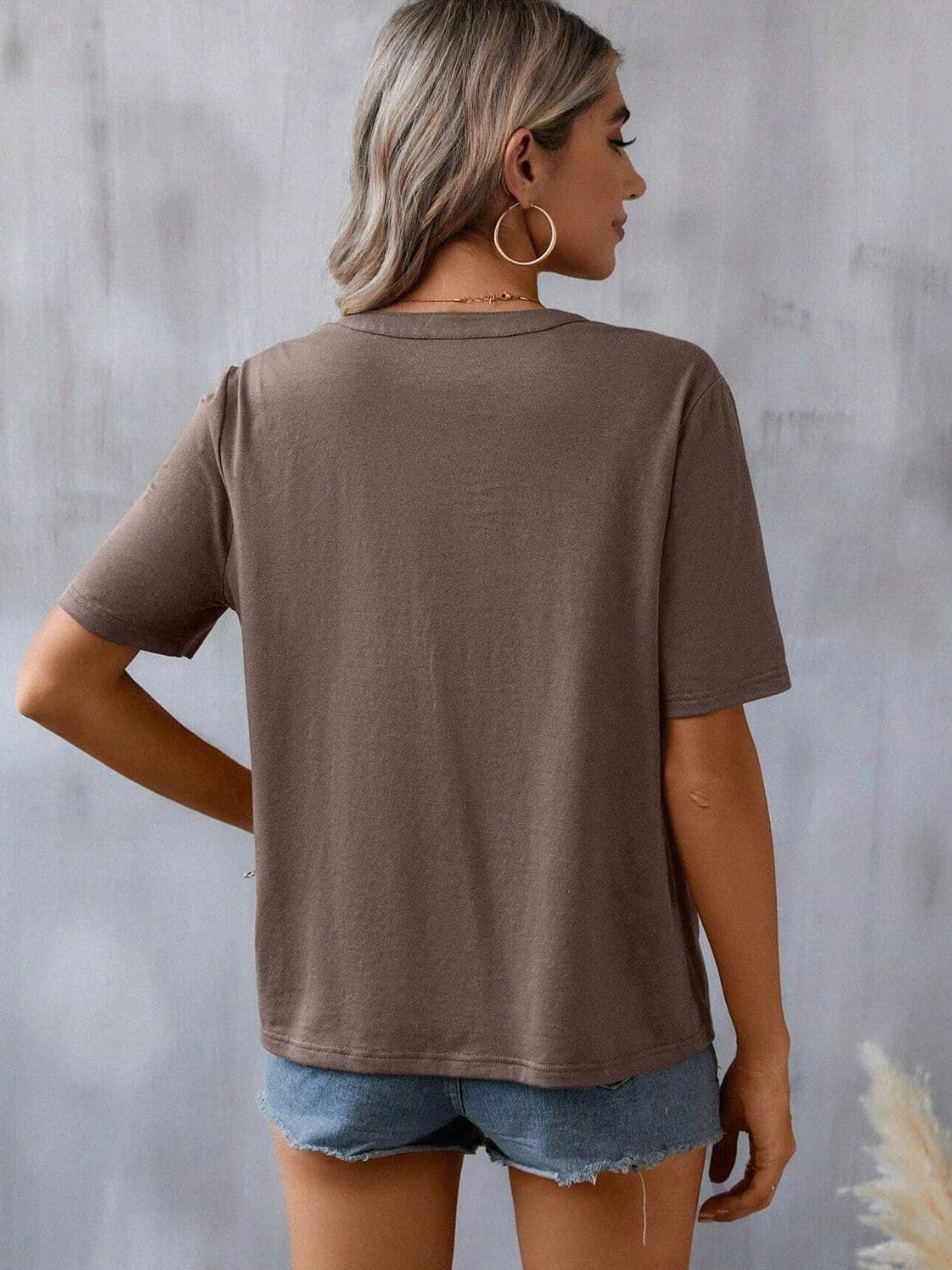 Embroidered Notched Short Sleeve T-Shirt.