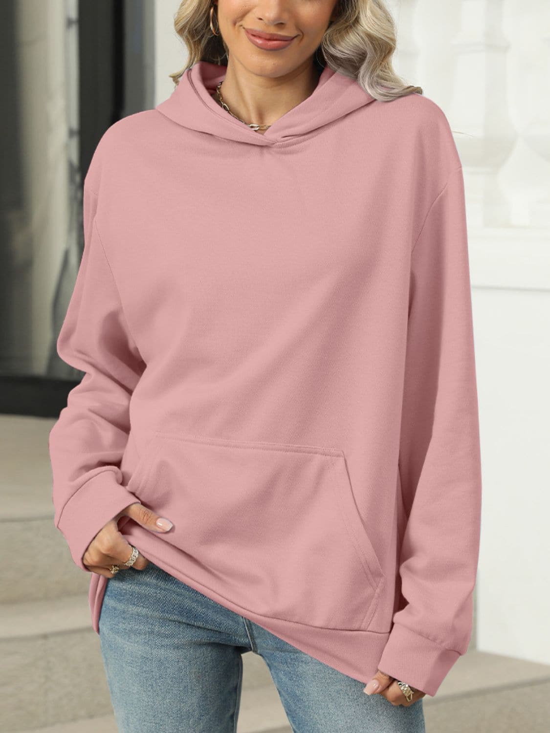 Sheer pocketed long sleeve hoodie with a cozy fit