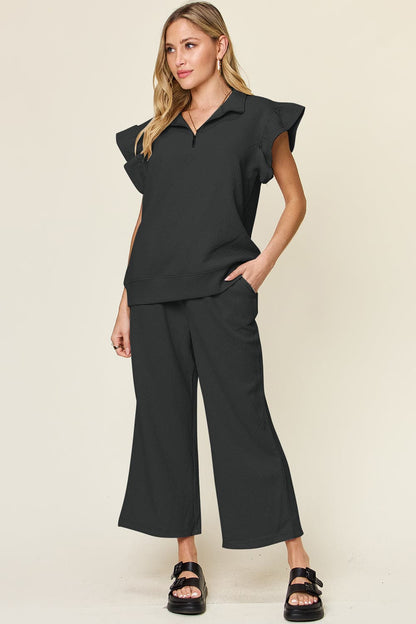 Double Take Texture Ruffle Short Sleeve Top and Drawstring Wide Leg PaFeatures: Drawstring, Pocketed
Number of pieces: Two-piece
Stretch: Slightly stretchy
Material composition: 97% polyester, 3% spandex
Care instructions: Machine washLove Salve Texture Ruffle Short Sleeve TopTwo-Piece Sets