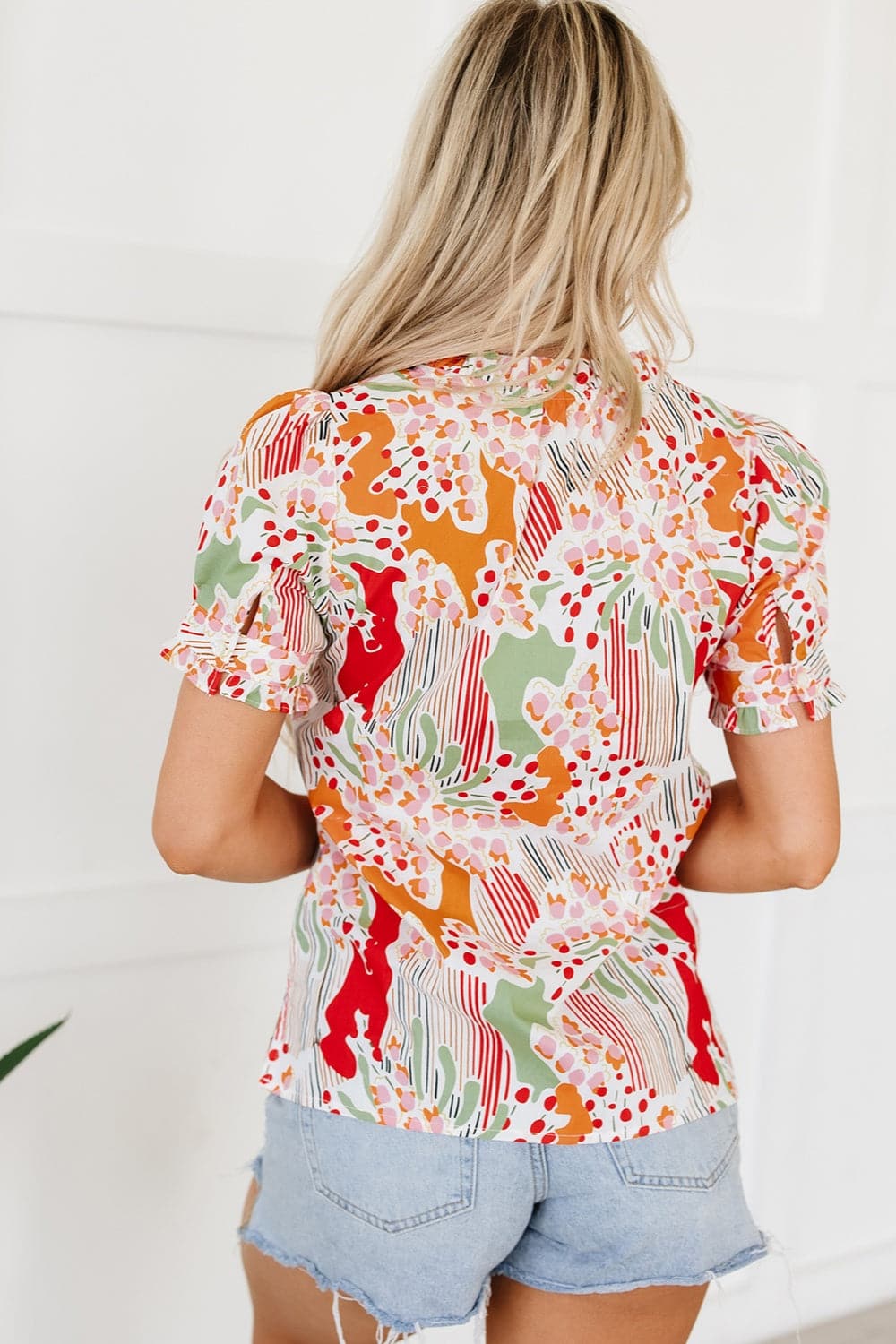 Printed Notched Short Sleeve Blouse.