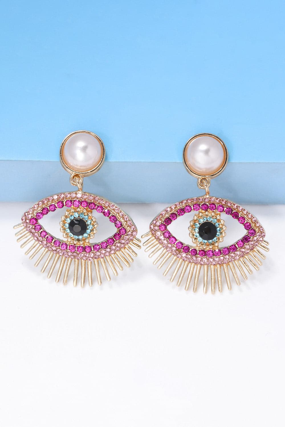 Rhinestone evil eye earrings