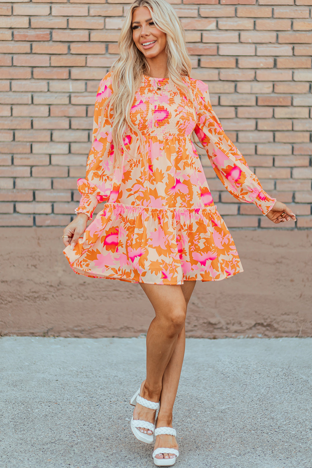 Orange smocked mini dress