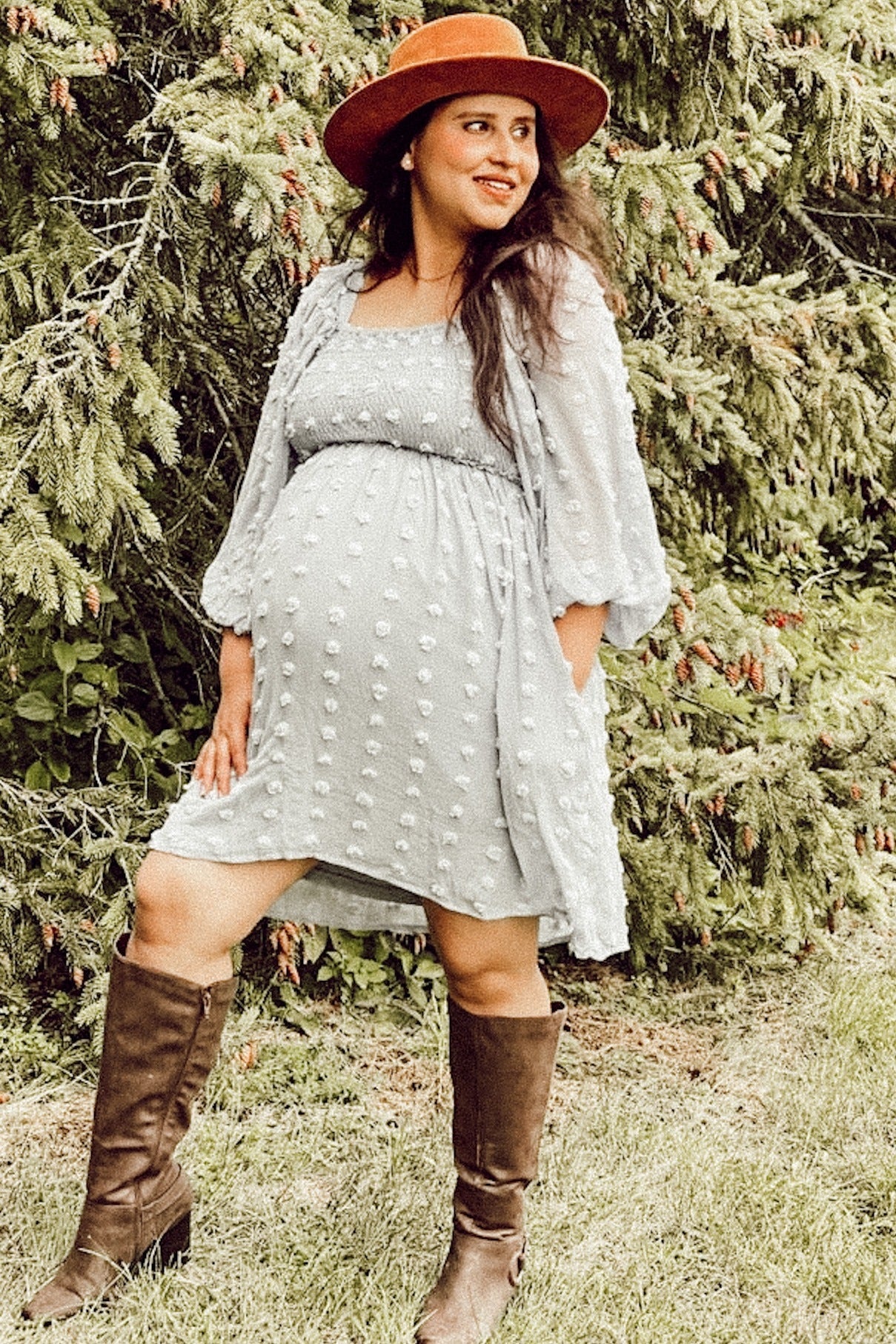 Square neck maternity dress front bodice with smocking and dot texture close-up