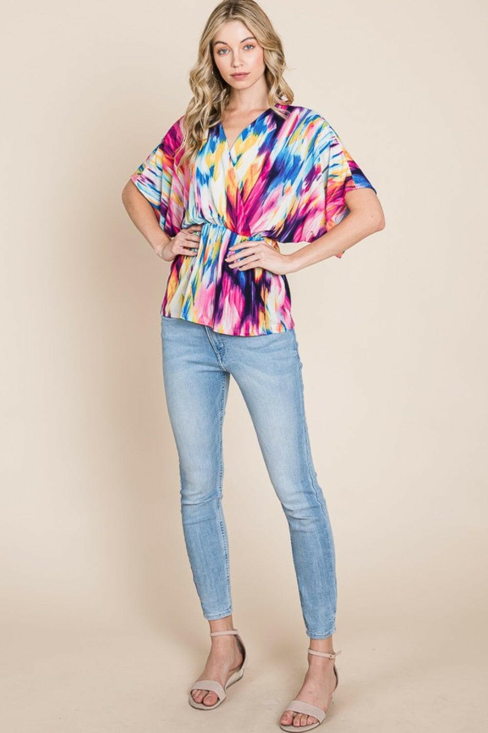 BOMBOM Printed Surplice Peplum Blouse.