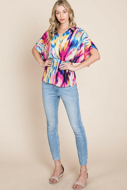 BOMBOM Printed Surplice Peplum Blouse.