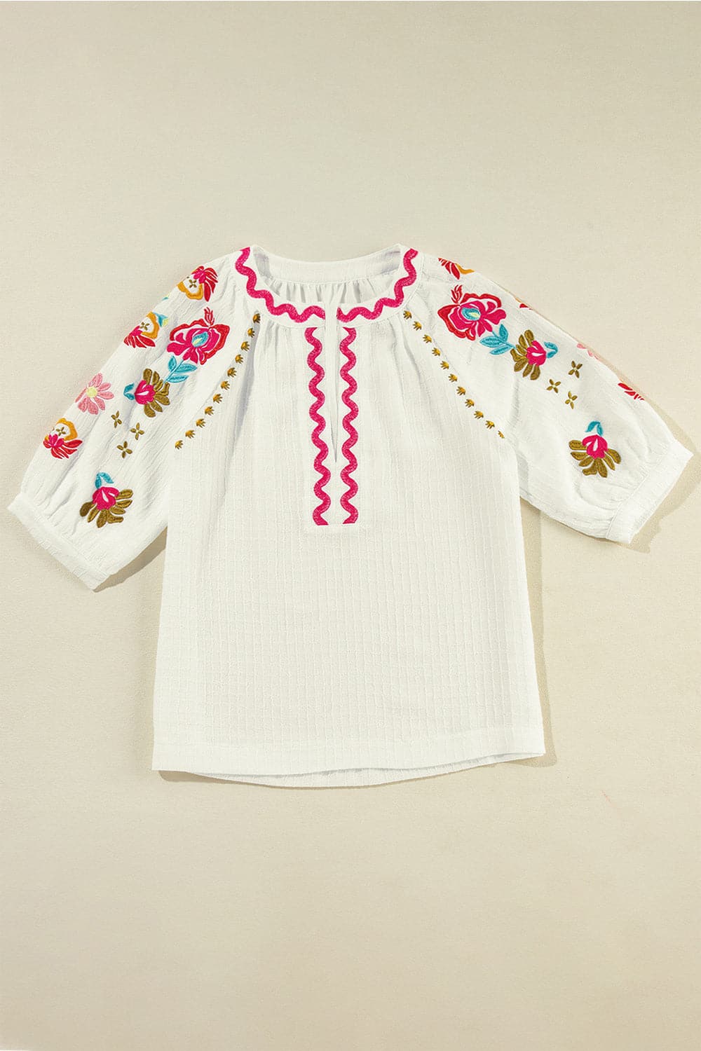 Embroidered Notched Half Sleeve Blouse.