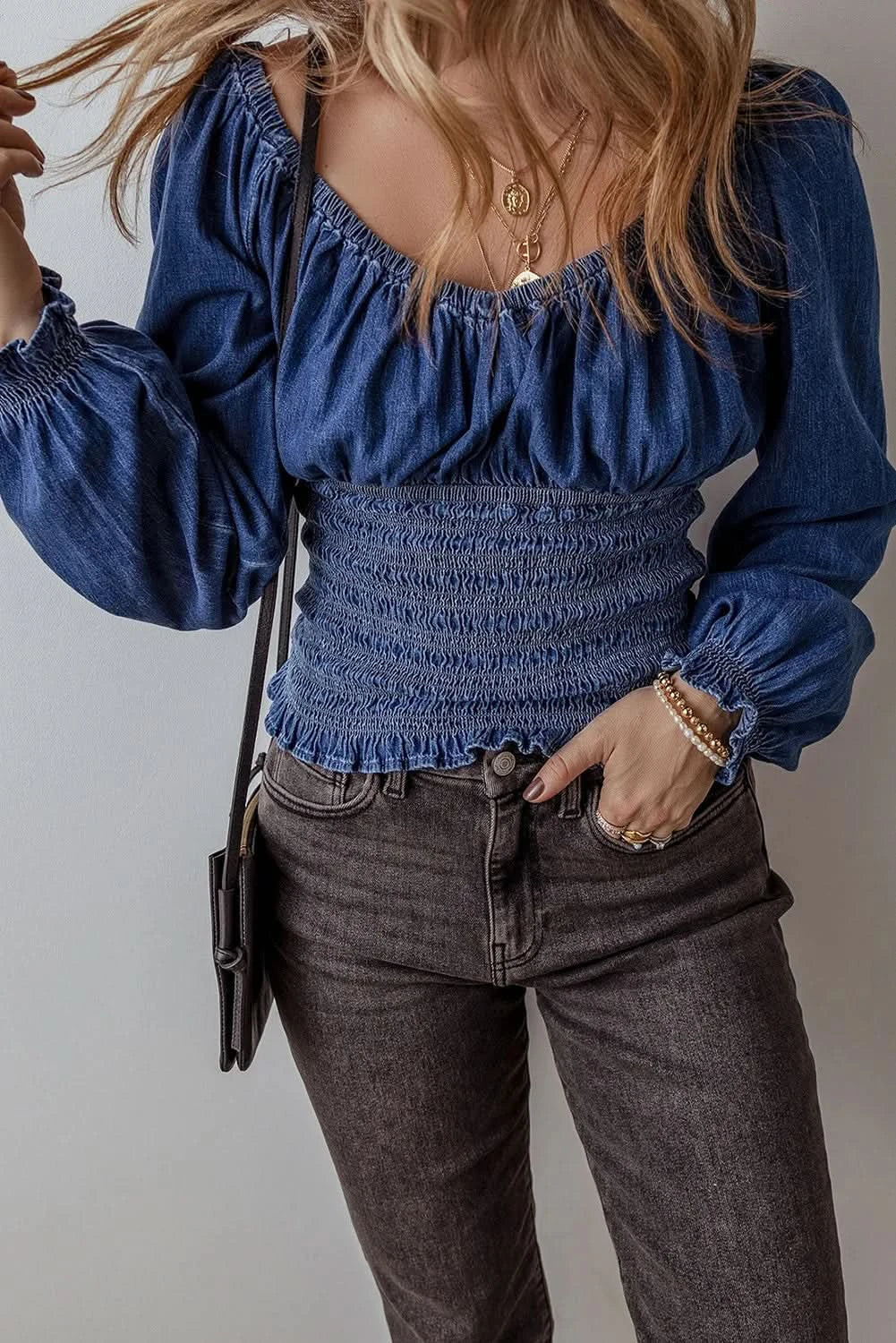 Smocked denim blouse with long sleeves