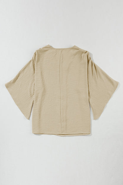 Parchment V neck crinkled blouse with wide sleeves