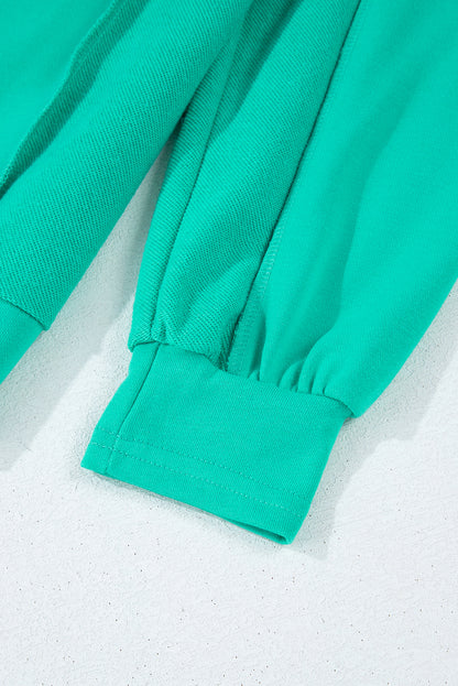 Mint green spliced pullover sweatshirt with round neckline