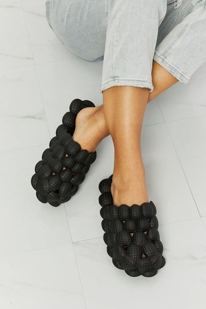 NOOK JOI Laid Back Bubble Slides in Black.