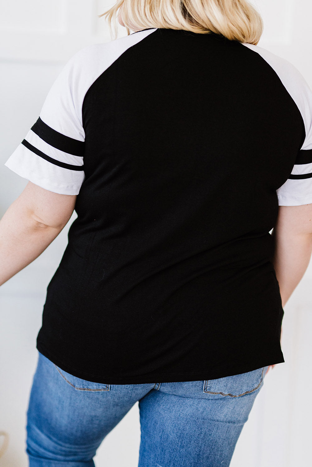 Chic black crisscross v-neck plus size tee with raglan sleeves