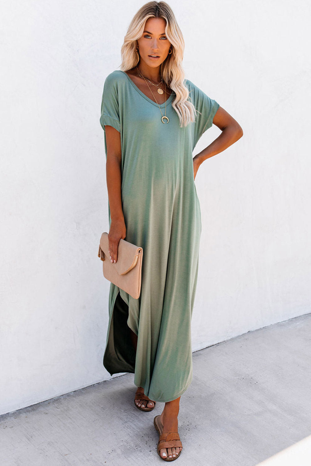 Elegant grass green maxi t-shirt dress with hidden pockets and stylish splits