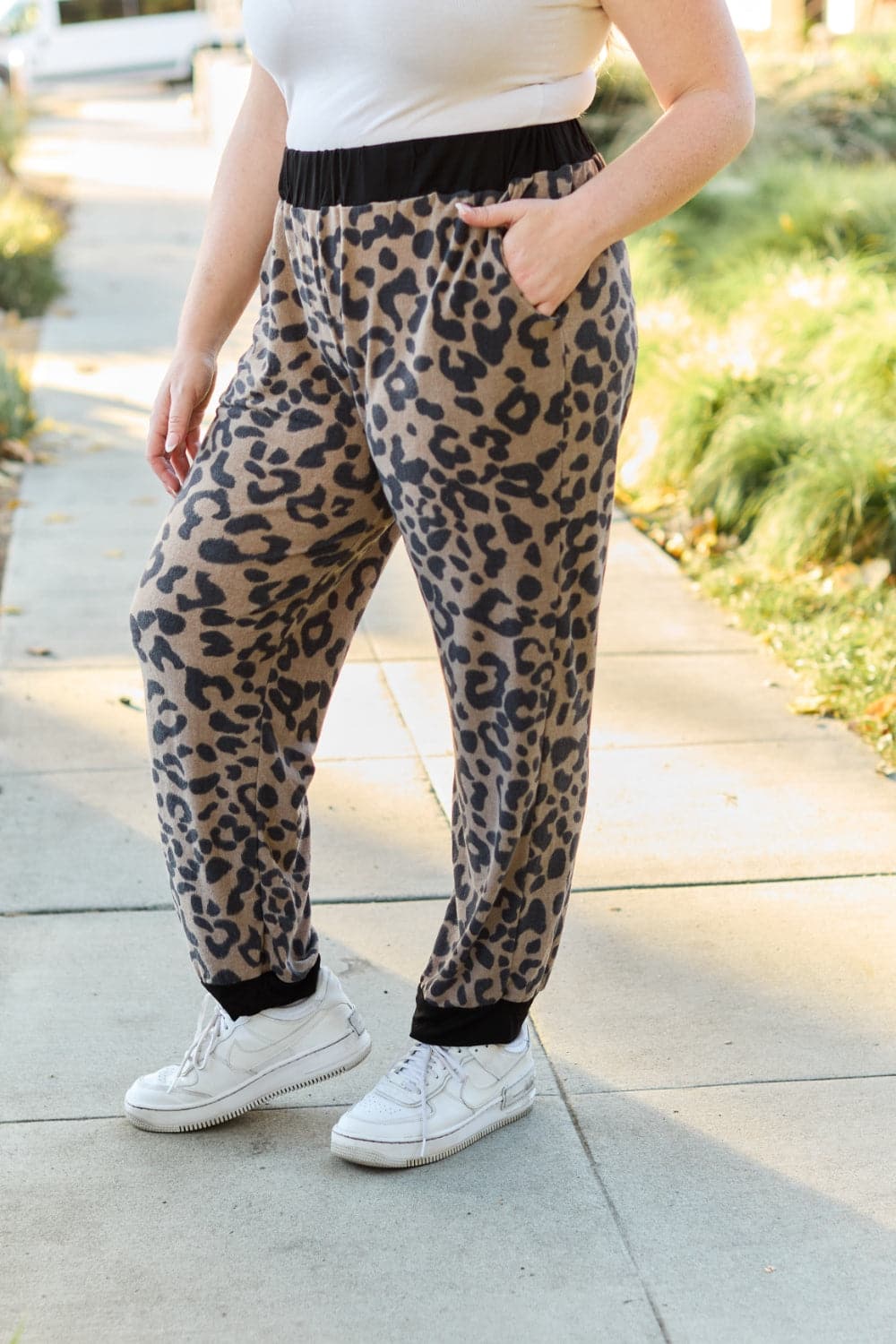 Celeste Design Full Size Leopard Contrast Sweatpants.