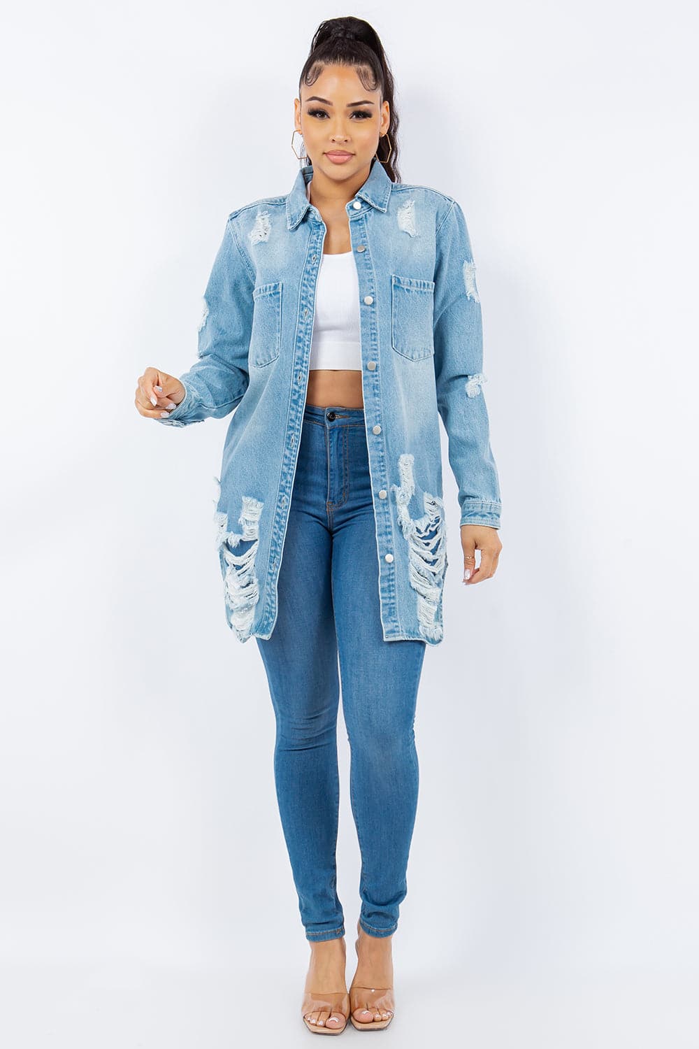 Stylish distressed denim jacket with button-up front