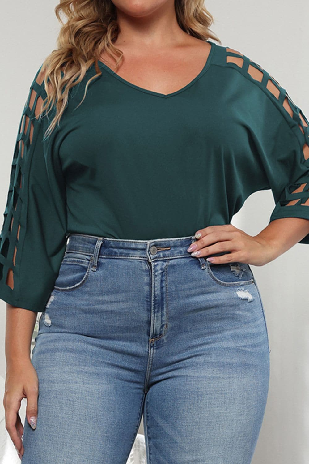 Plus Size Cutout Three-Quarter Sleeve Blouse.