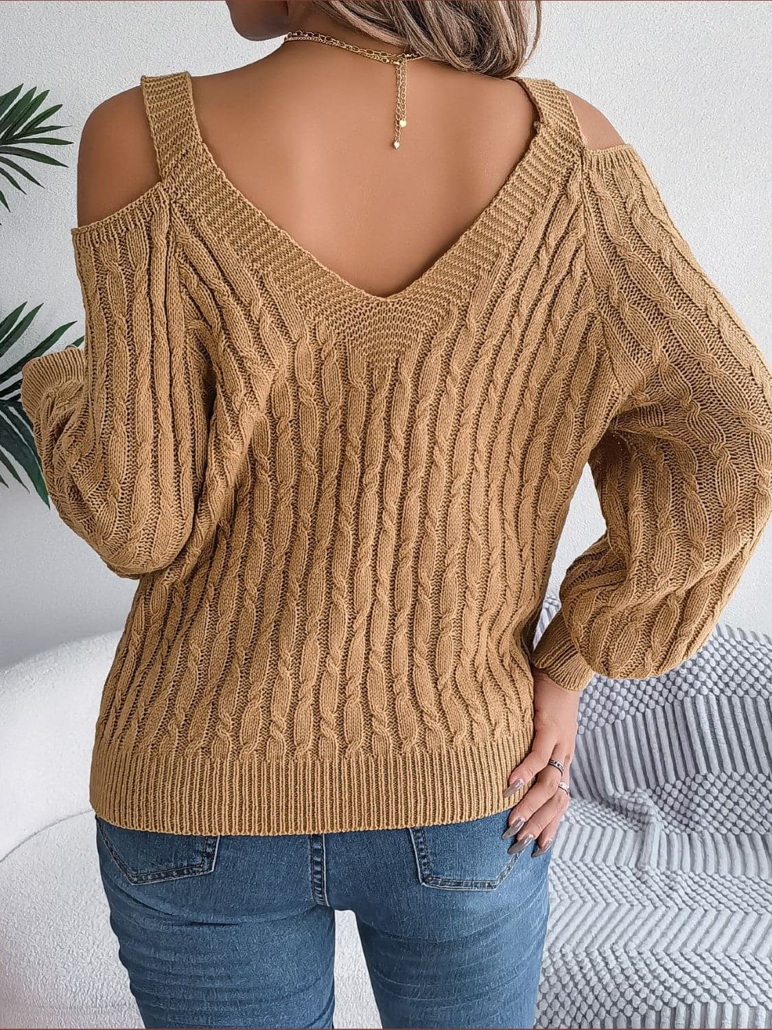 Cable-Knit Cold Shoulder Long Sleeve Sweater.