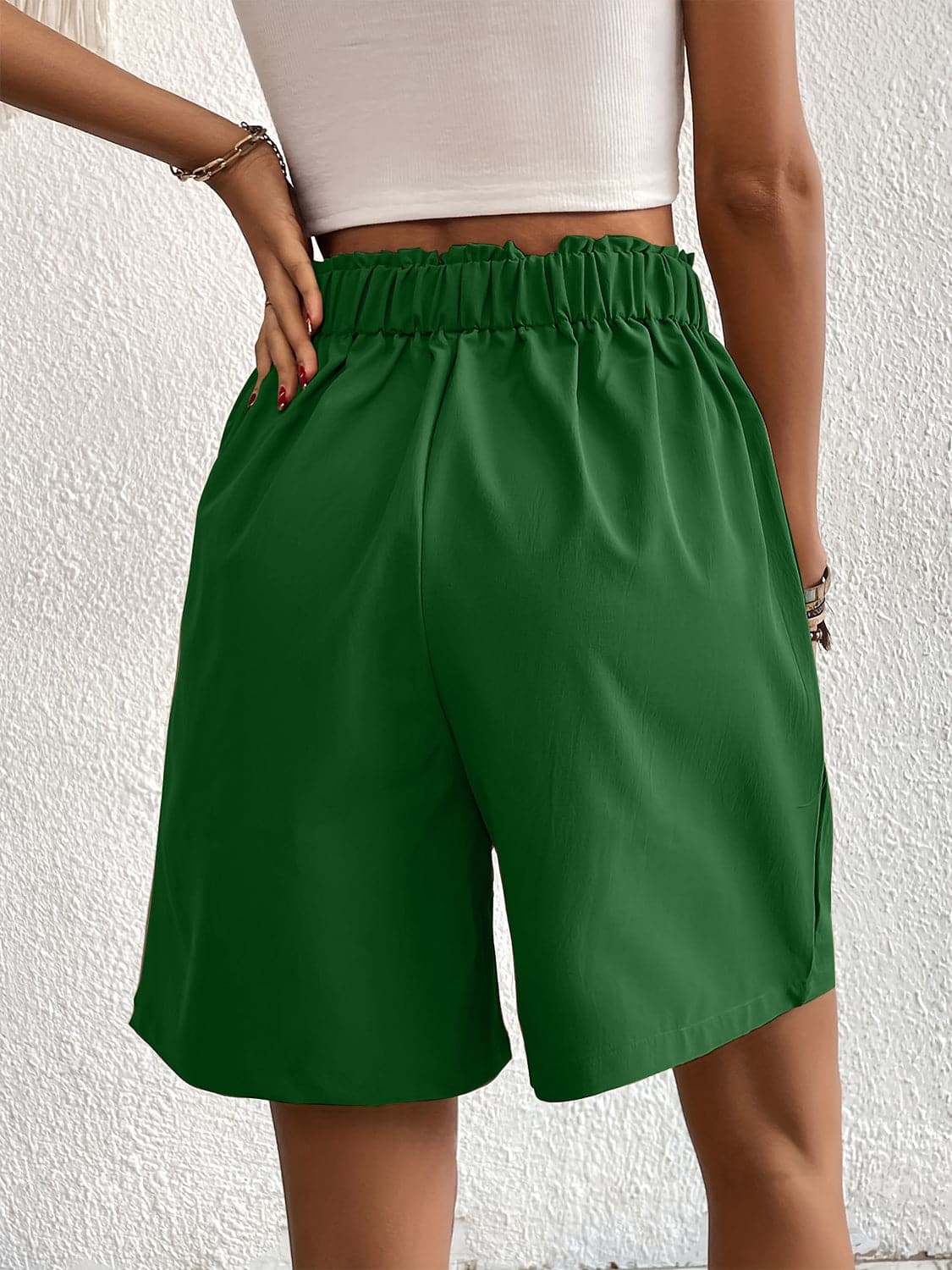 Pocketed Half Elastic Waist Shorts.