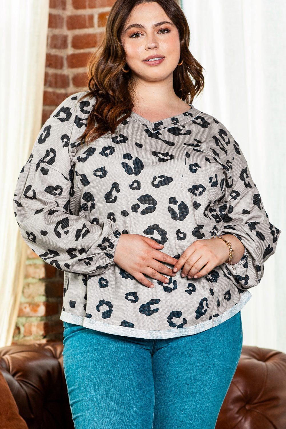 Trendy gray leopard print thermal knit top with playful balloon sleeves