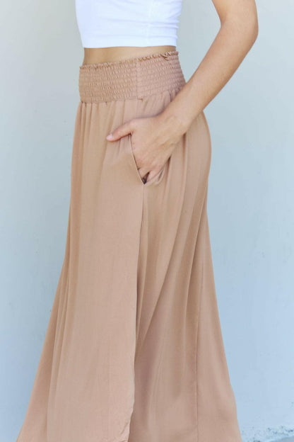 Doublju Comfort Princess Full Size High Waist Scoop Hem Maxi Skirt in Tan.