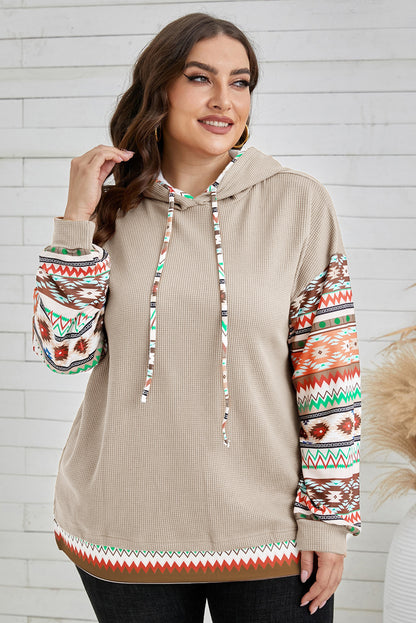 Smoke gray plus-size hoodie with Aztec patchwork sleeves and waffle texture