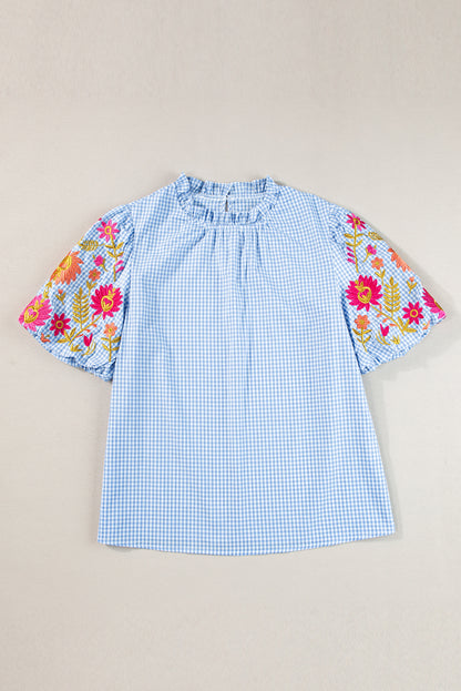 Light blue floral embroidered blouse with puff sleeves and gingham pattern