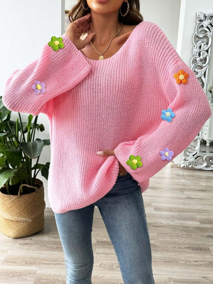 Floral print long sleeve sweater with a round neck