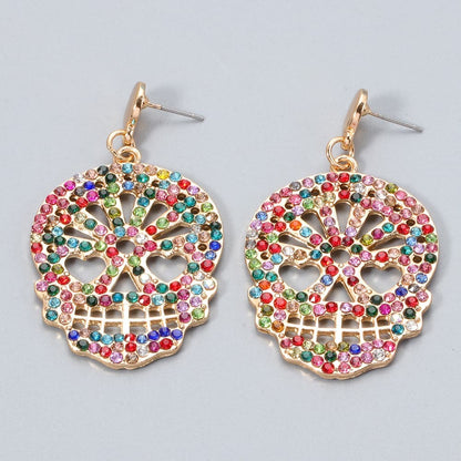 Rhinestone skull earrings in alloy