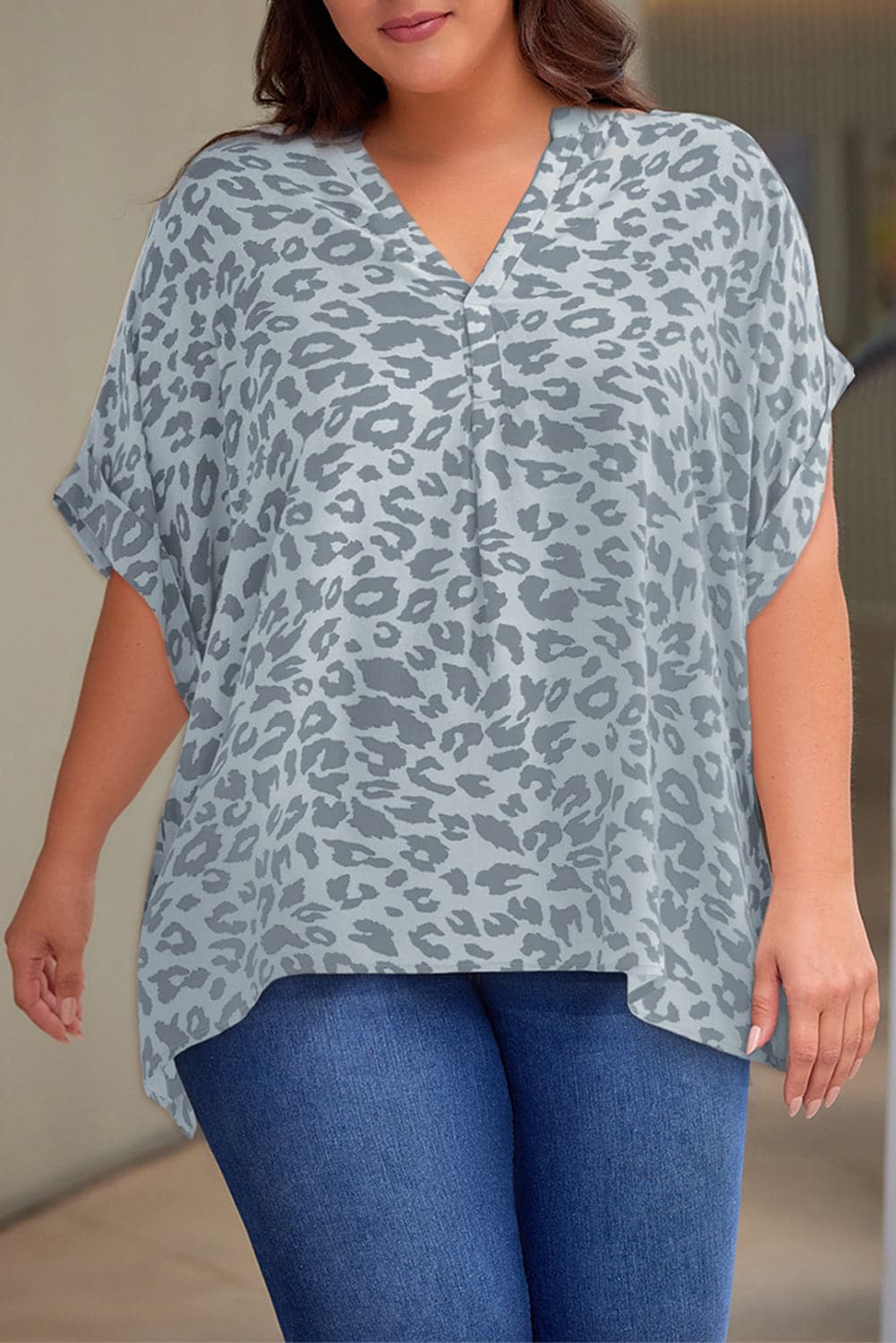 Plus Size Printed Notched Neck Half Sleeve Top.