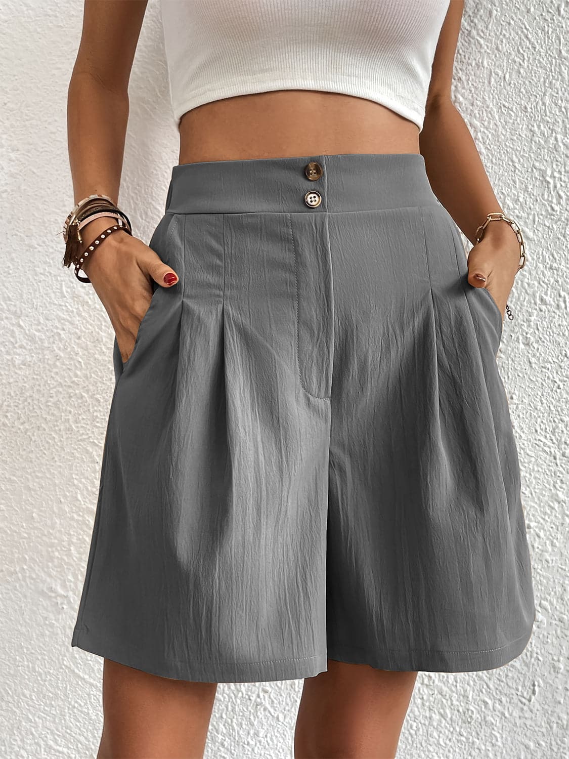 Pocketed Half Elastic Waist Shorts.