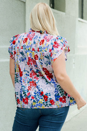 Plus Size Floral Smocked Flutter Sleeve Blouse.