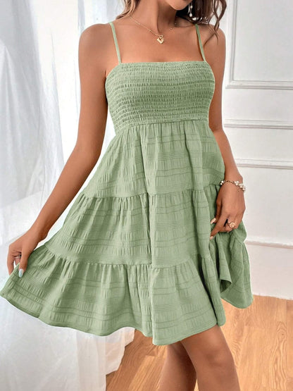 Smocked Tiered Sleeveless Mini Dress.