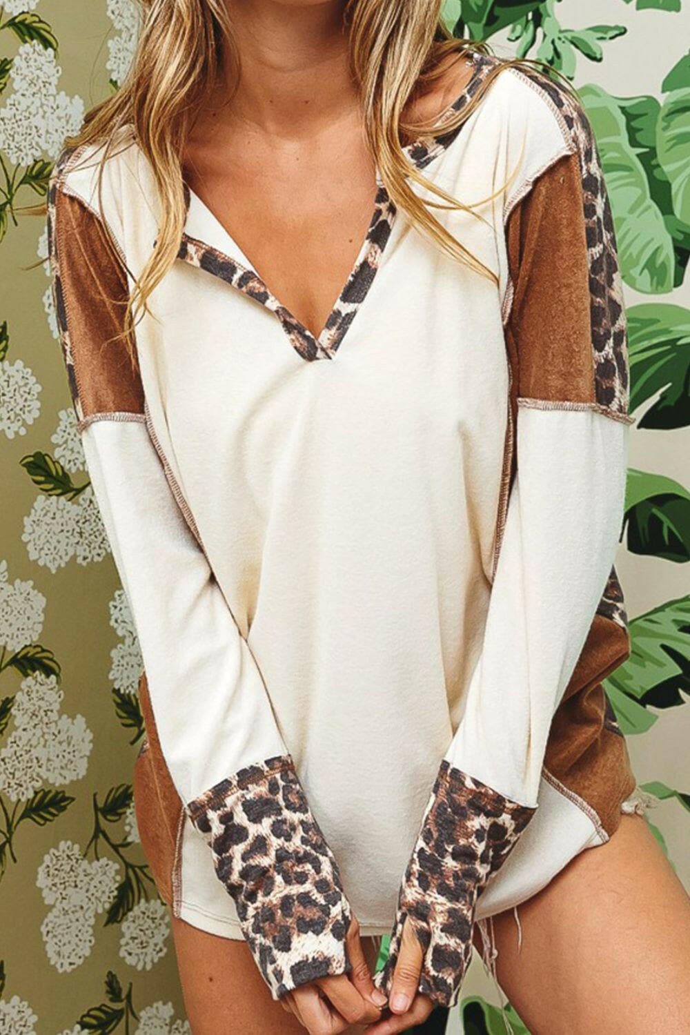 Leopard V-Neck Dropped Shoulder BlouseUpgrade Your Wardrobe with Style and Comfort
 Indulge in effortless elegance with our Leopard V-Neck Dropped Shoulder Blouse. This versatile blouse is a must-have foLove Salve -Neck Dropped Shoulder BlouseBlouses