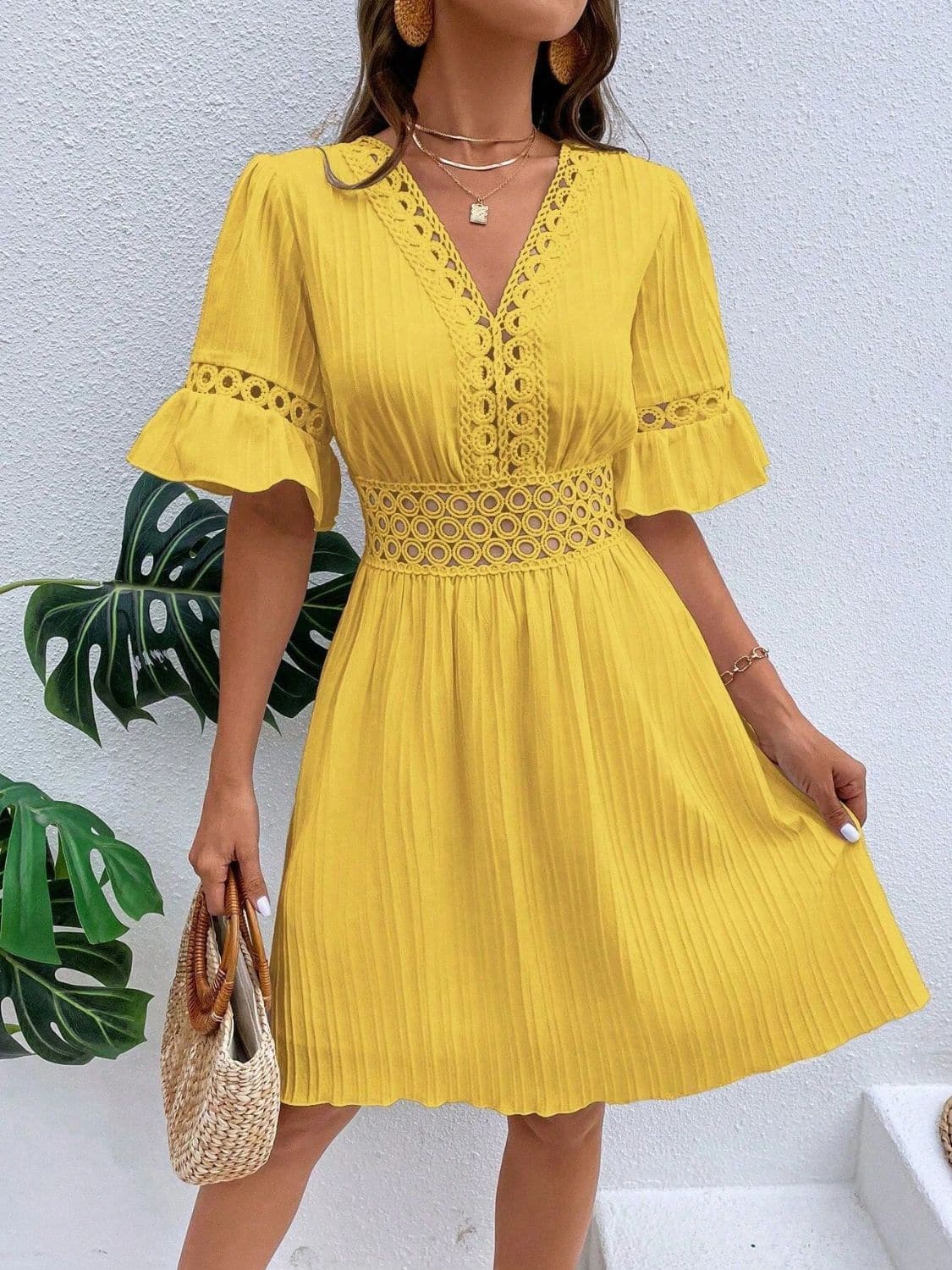 Cutout V-Neck Flounce Sleeve Mini Dress.