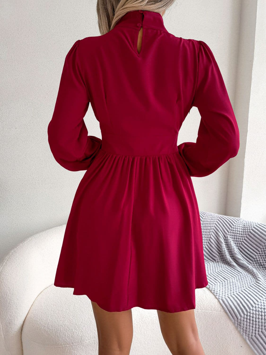 Cutout Turtleneck A-Line Mini Dress.