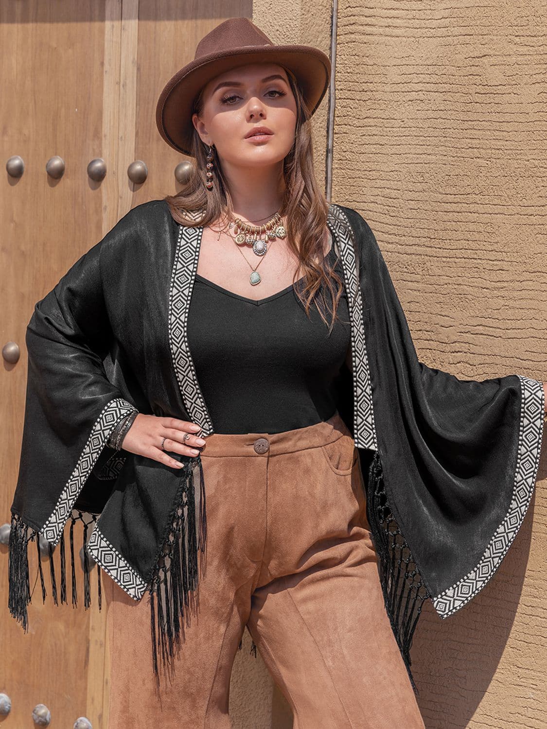 Plus Size Geometric Open Front Fringe Hem Cardigan.