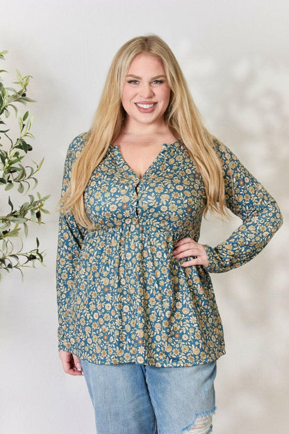 Heimish Full Size Floral Half Button Long Sleeve Blouse.