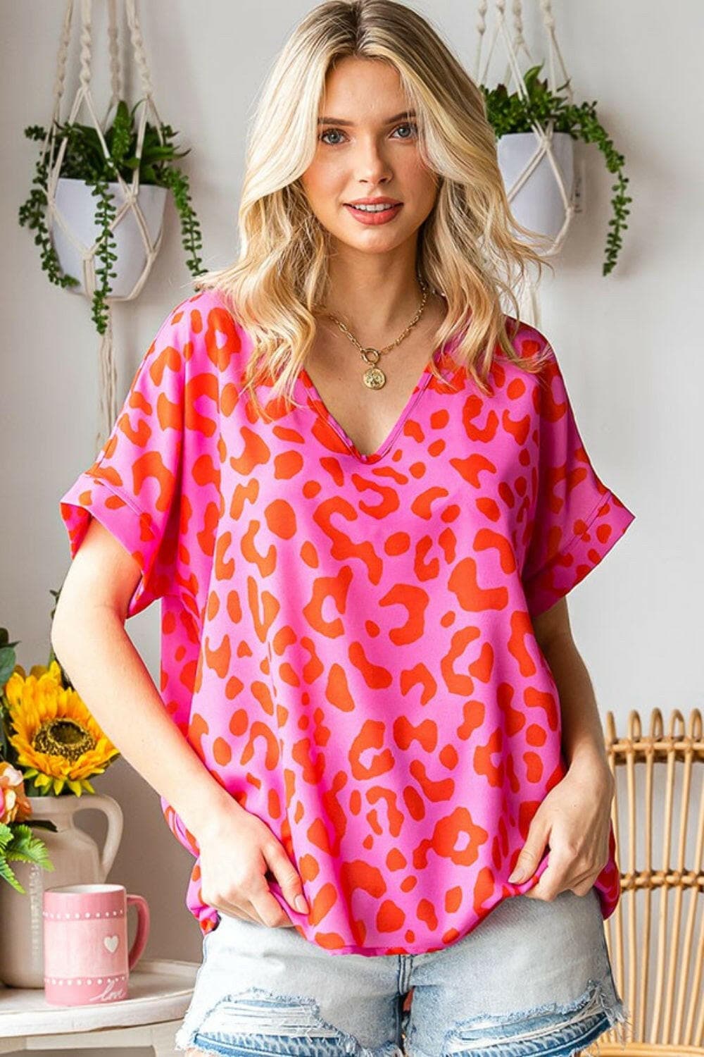 First Love Leopard V-Neck Short Sleeve Woven TopElevate Your Wardrobe with the First Love Leopard V-Neck Short Sleeve Woven Top
 The First Love Leopard V-Neck Short Sleeve Woven Top is the perfect fusion of bold sLove Salve -Neck Short Sleeve Woven Topusa