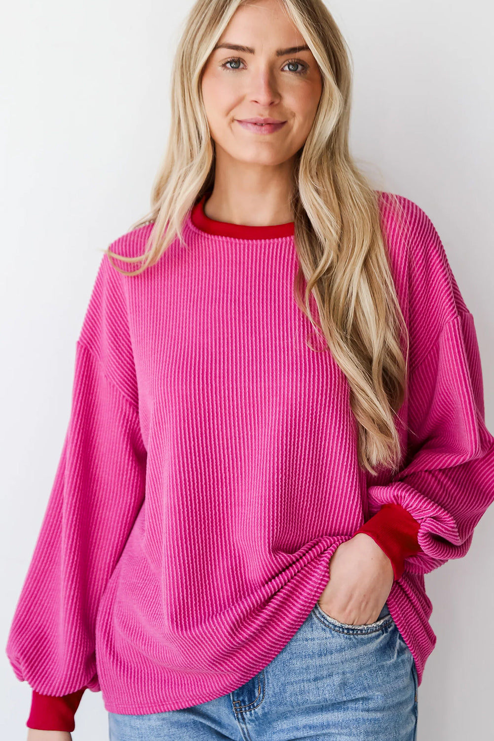 Bright pink drop shoulder top