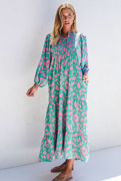 Floral smocked tie neck long sleeve dress